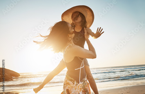 Картината върху платно Holiday, mother and child with carry at beach for bonding together, summer vacation or sunshine