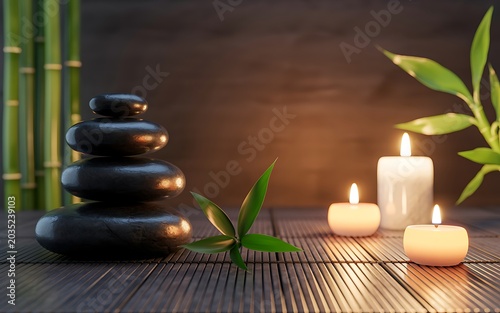 Serene spa setup with candles and stones on bamboo mat