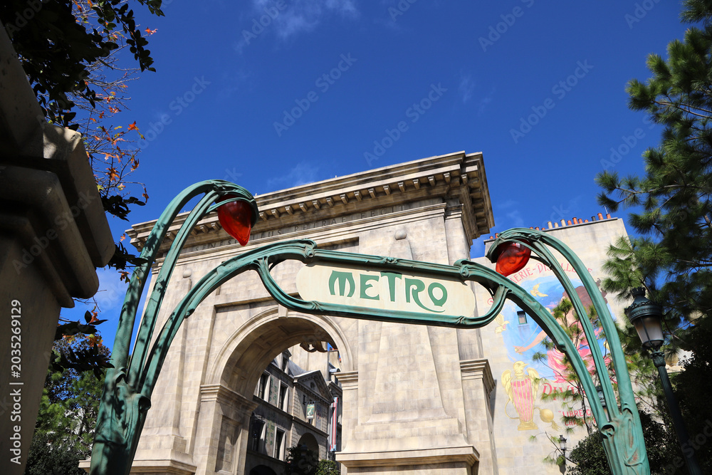 Naklejka premium Entrance to the Parisian-style Harry Potter themed area and Metro sign at Epic Universe theme park