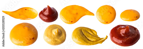 Принти на полотні Various sauces including mustard, ketchup, and barbecue sauce arranged on a isol
