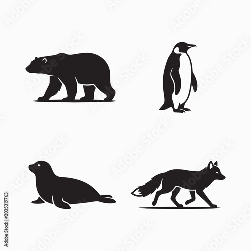 Obraz na płótnie Four animal silhouettes: polar bear penguin seal fox against a white background