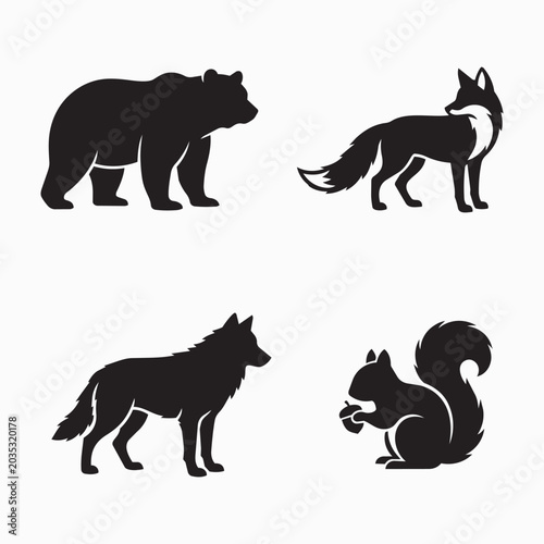 Fotografija Four forest animal silhouettes: bear fox wolf squirrel holding a nut with black