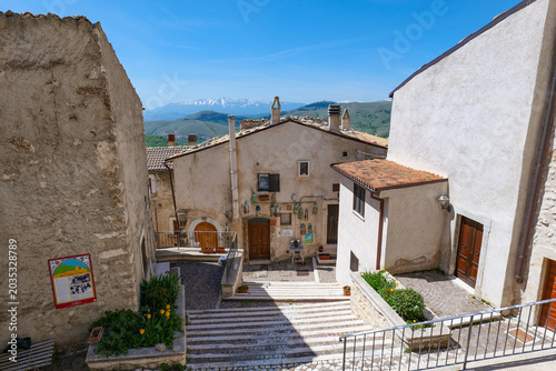 A street among the houses of Castel del Monte, a small town in Abruzzo, Italy.	