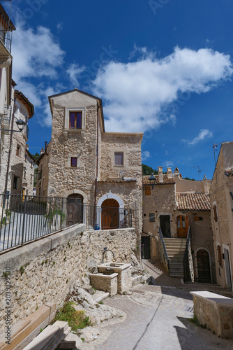 A street among the houses of Castel del Monte, a small town in Abruzzo, Italy.	