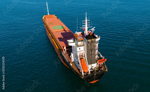 Canvastavla Rear elevated drone capture highlighting the superstructure of a cargo ship