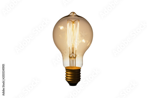 Foto Isolated vintage Edison style filament light bulb, glowing with warm incandescen