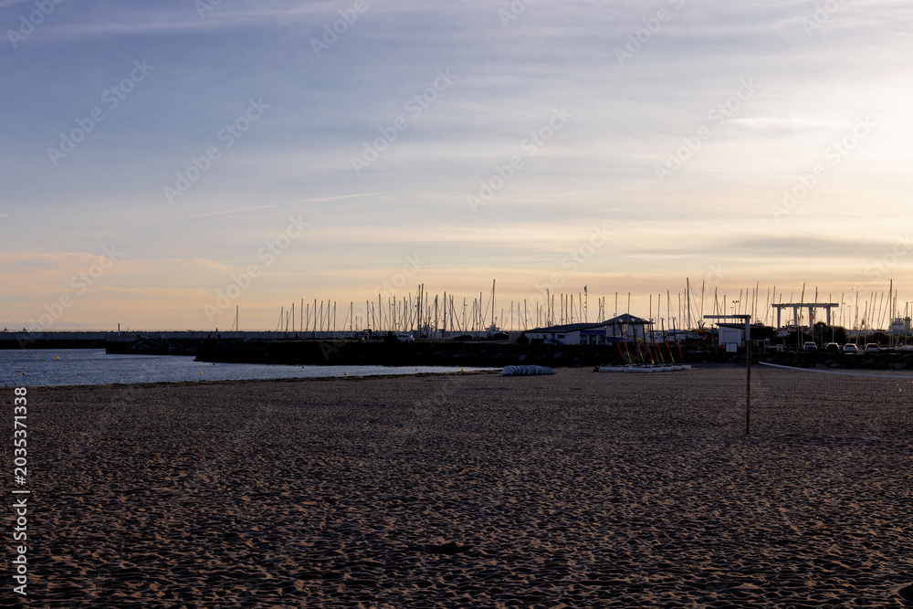 Obraz premium Harbor with sailboats in La Turballe, Brittany, in the evening light