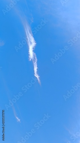 Wispy clouds sky