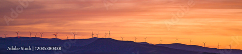 Wind turbines in mountainous region landscape in Taza, Morocco during, renewable energy for clean environment
