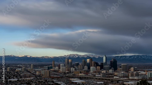Salt Lake City skyline with mountains at sunset 4K Video