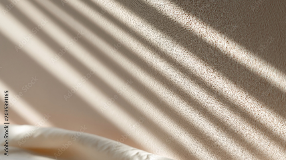 Fototapeta premium Soft cinematic shadows on textured beige wall, abstract luxury background, minimalist design aesthetic, natural sunlight pattern, elegant neutral tones, modern backdrop, with copy