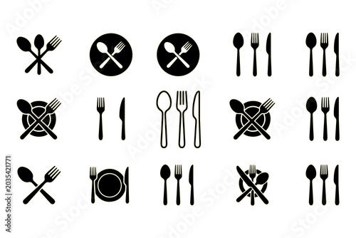 Valokuva A variety of black silhouette icons depict different dining arrangements including crossed cutlery, plates, and cutlery sets on a clean white background