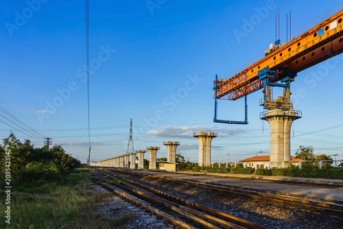Photos Construction of massive elevated railway viaduct using  gantry crane for girder installation