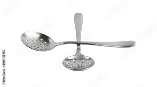Crossed Stainless Steel Slotted Spoons Isolated On White