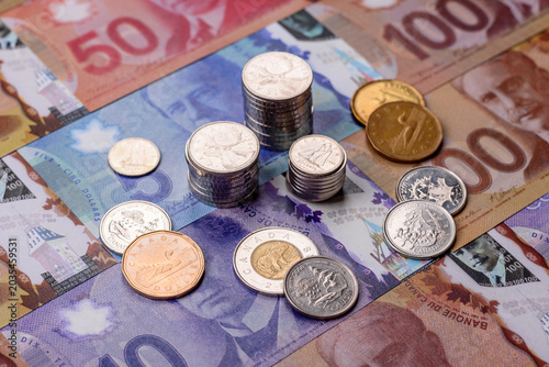 Money, currency of Canada, dollar banknotes of various denominations. Canadian money
