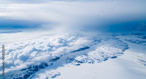 Aerial view of a dramatic cloud formation over a frozen arctic landscape