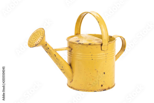 Fotografie Yellow metal watering can with handle and spout, isolated on transparent backgro