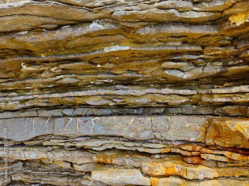 Konstfotografi Detailed view of geological strata and rock formations, showing natural stratification and erosion patterns