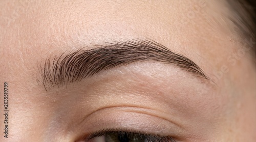 Close-up of a perfectly shaped eyebrow, beauty and skincare concept