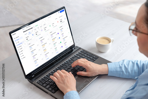 Project management dashboard displayed on laptop during remote workflow session, featuring task organization, planning tools and productivity analytics interface