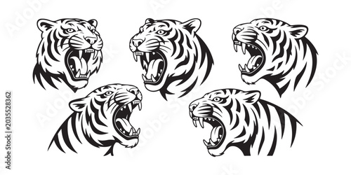Photos Collection of roaring tiger head silhouettes, black and white predator mascot ve
