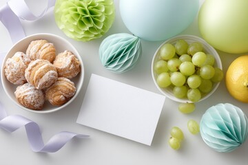 Juneteenth celebration flatlay with blank invitation card, pastel decorations, pastries and fruit for party invitation mockup and background design