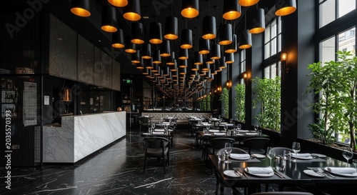 Modern upscale restaurant interior with stylish black decor, elegant marble counter, and warm pendant lighting