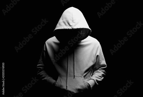 Person in hood. Black and white portrait