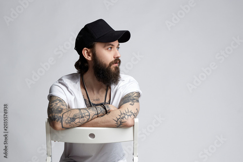 Tattooed handsome Man in Hat