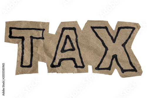 Cuadro en lienzo Handwritten bold TAX lettering on rustic brown financial concept paper