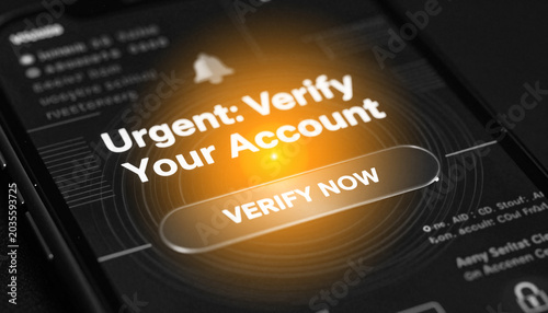 Smartphone screen with urgent account verification notification and verify now button. Concept of cyber security alert, phishing threat, and digital identity protection