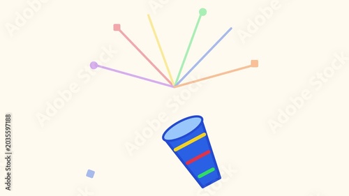Colorful confetti explodes from a vibrant party cup outdoors in daytime