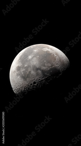 Detailed Gibbous Moon with Visible Craters and Surface Texture Isolated on Black Space Background.
