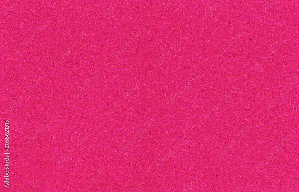 Fototapeta premium Bright pink paper texture background with soft handcrafted surface. Vibrant abstract backdrop for creative and modern designs.