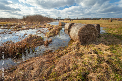 Hay Bales in Flooded Meadow