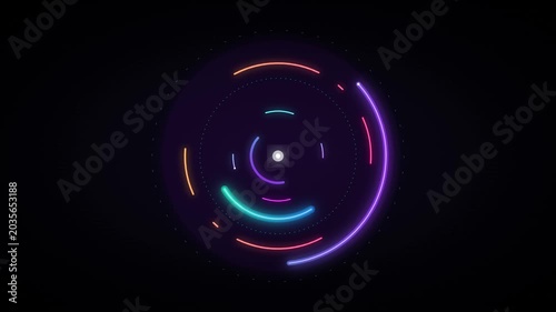 Glowing neon circular patterns illuminate dark space with vibrant colors