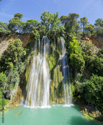 Sillans-la-Cascade, Provençal village in Verdon Natural Park, famous for its impressive high waterfall and the turquoise lagoon that flows out of it
