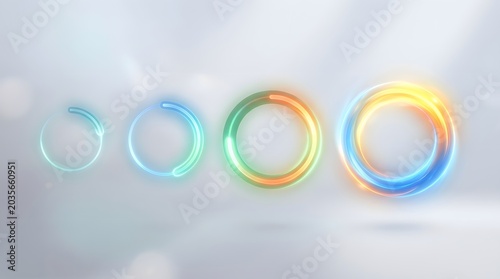 Progressive glowing loading rings in various vibrant colors against soft studio background.