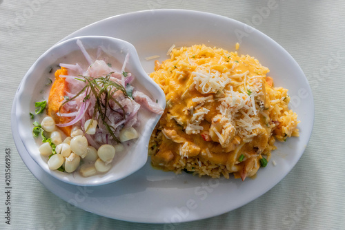 Canvas Print Dish in Peru - duo marino - ceviche and arroz con mariscos (rice with seafood)