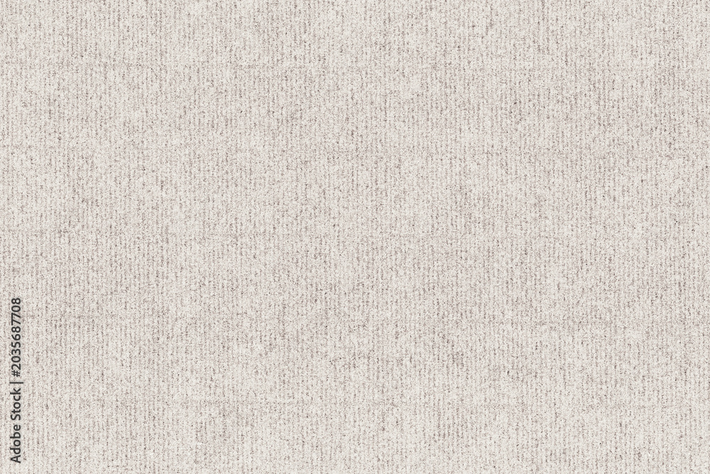 Fototapeta premium Beige textured fabric background with a subtle woven pattern