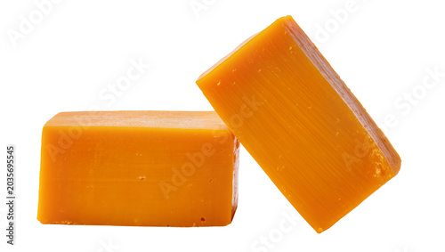 Canvas Print Isolated delicious rich orange cheddar cheese blocks, ideal for cooking and plat