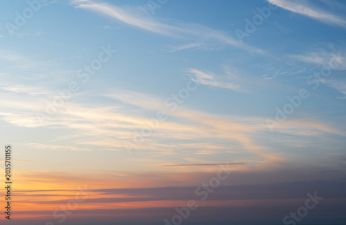 Clouds at sunset on the sky.