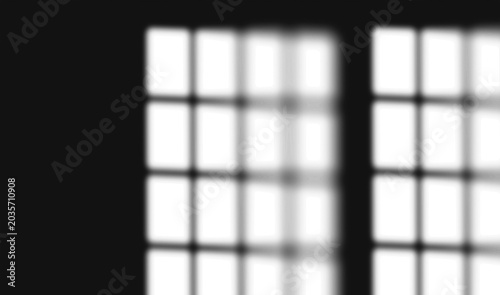 Quadro su tela Double window grid shadow pattern cast on dark wall with dark edge