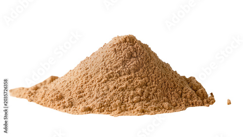 Fotografie Isolated heap of light brown granular dry powder material, ideal for food, spice
