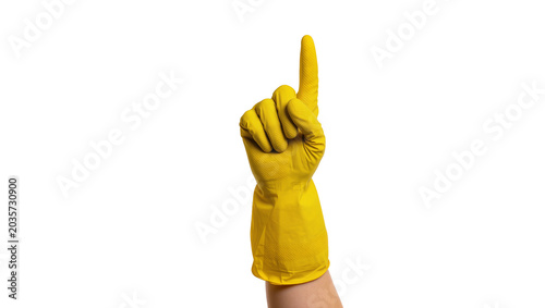 Obraz na plátně Isolated hand wearing a bright yellow rubber cleaning glove pointing index finge