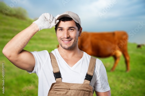 Schilderij op canvas Happy handsome senior farmer in glaves