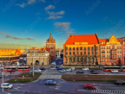 renesance Highland Gate, the medieval Prison Tower, and historic townhouses during sunset in Gdansk, Poland