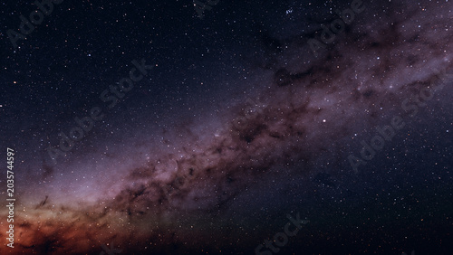 Tableau sur toile Milky Way Galaxy Stretching Across Night Sky With Dense Star Field And Dust Lane