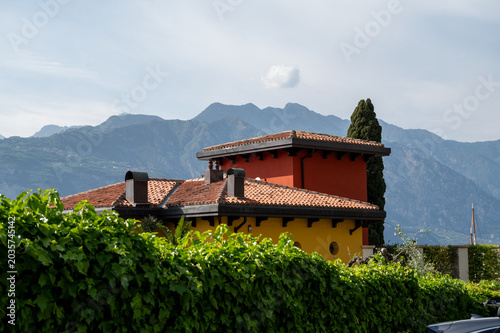 Mediterranean-style house with mountain view near Lake Garda, Italy.