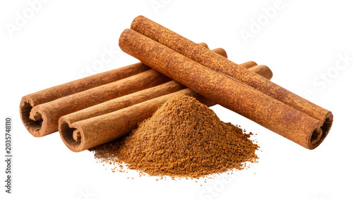 Tableau sur toile Isolated cinnamon sticks and a pile of ground spice, fragrant aromatic cooking ingredient